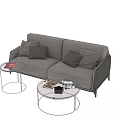Modern Gray Two Seater Sofa With Multiple Pillows And Round Glass Coffee Tables