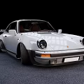 White Classic Porsche Sports Car With Widebody Black Wheels And Brown Interior