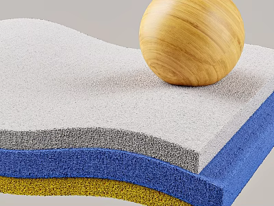 Wooden Ball Placed On Layered Foam Mats With Various Colors And Textures 3d model