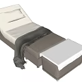 Comfortable Upholstered Massage Bed With Gray Pillow Black Throw Blanket And Footrest