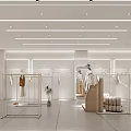 Modern Clothing Store Interior Design With Mannequins Clothing Racks And Decorative Plants