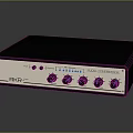 Sleek AKR Headphone Audio Device With Control Knobs And Indicator Lights