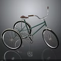 Green Tricycle Bicycle With Brown Seat White Handlebars And Silver Wheels On Gray Background