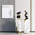 Two Modern Sculptures On Marble Pedestals With Gold Accents In Contemporary Interior Space
