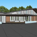 Modern Sloped Roof Building Design With Surrounding Trees Blue Sky And Paved Square
