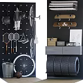 Sports Equipment Wall Display With Badminton Tennis Rackets Bicycle Skateboards And Tires