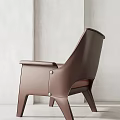 Modern Brown Leather Leisure Chair With Armrest And Light Colored Wall