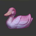 Pink and White Duck Decorative Figurine With Yellow Beak And Textured Wings On Dark Surface