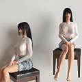 Women in White Top and Floral Skirt Sitting on Chairs Against Light Colored Wall
