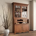 Wooden Decorative Cabinet with Glass Doors Shelves Holding Books Decorations Near White Vase Dried Branches