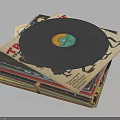 Vintage Vinyl Record Resting On Stack Of Colorful Album Covers