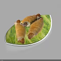 Delicious Stuffed Croissant Rolls on Green Leaf Shaped Plate with Savory Filling