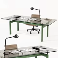 Glass Top Desk With Green Legs Wooden Chair Desk Lamp And Stacked Books