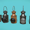 Vintage Multiple Candle Lanterns in Black and Brown With Handles on Light Blue Background