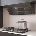 Modern Kitchen Cookware With Black Cabinets Range Hood And Stainless Steel Pot On Gas Stove