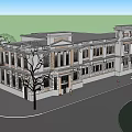Classical Style Building Exterior Featuring Decorative Facade Stairs Windows And Tree In Front
