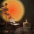 Floor Lamp With Sunset Projection Creating Cozy Indoor Atmosphere And Armchair Side Table Potted Plant