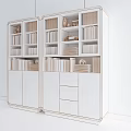 Modern White Bookcase Interior With Colorful Books Decorative Items And Glass Doors