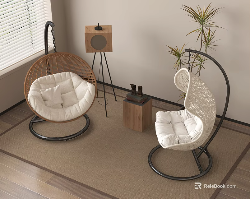 Two Indoor Rattan Hanging Chairs With White Cushions And Potted Plant In Living Space 3d model 