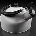 Silver Stainless Steel Kettle With Black Handle And Modern Boiling Design