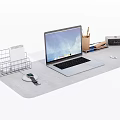 Laptop on Gray Desk Mat with Metal Wire File Holder Pen Holder Calendar Smartwatch Charger