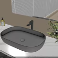 Gray Washbasin on Marble Countertop with Mirror Soap Dispensers and White Flowers in Bathroom Interior