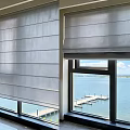 White Roman Blinds with Layered Design for Lake View Window with Dock
