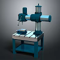 Industrial Drill Press With Metal Worktable Blue Base And Motorized Structure For Workshop Use