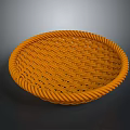 Orange Woven Round Basket With Intricate Texture On Dark Background