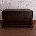 Dark Brown Wooden Nightstand with Two Drawers on Wooden Floor Against White Textured Wall