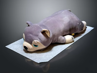Cute Purple Plush Toy Lying Down With Blue Eyes On Gray Mat 3d model