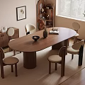 Warm Toned Modern Dining Room With Oval Wooden Table Chairs Side Cabinet And Green Plant