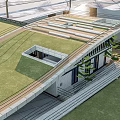 Modern Pavilion With Green Roof And Geometric Structure Surrounded By Lawn And Plants