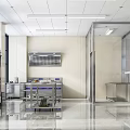 Modern Commercial Kitchen Interior With Stainless Steel Worktables Range Hood And Shiny Floor