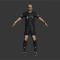 Man in Black Referee Uniform with Short Sleeves Shorts and Chest Badge