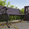 Commercial Outdoor Waste Sorting Equipment Next To Wooden Bench With Green Plants And Fallen Leaves