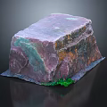 Natural Multicolor Stone with Purple Green Orange Hues Rough Surface and Green Plants