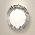 Ornate Round Wall Mirror With Golden Ornate Frame Reflects Bedroom