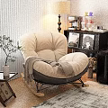Plush Beige Single Seater Rocking Sofa With Gray Blanket In Cozy Living Room