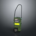 Green Industrial Device With Black Handle And Yellow Information Label