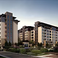 Modern Residential Building Complex With Lush Gardens Pathways And Green Lawns