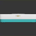 Square Device With Blue Green Striped Pattern And Circular Control Panel