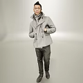 Man in Gray Double Breasted Coat With Scarf Dark Pants Leather Shoes in Minimalist Studio