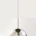 Modern Transparent Glass Pendant Lights With Metal Base And Globular Shape Hanging In A Row
