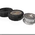Automotive Car Parts with Worn Black Tires and Silver Wheel Rims