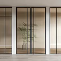 Modern Interior Glass Doors With Black Frames And Potted Plant