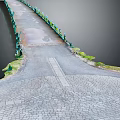 Waterfront Walkway Design With Cobblestone Pavement Green Railings And Grass