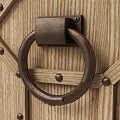Wooden Trunk with Geometric Pattern Design Metal Ring Handle and Riveted Edges in Vintage Style