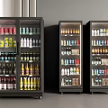 Three Commercial Glass Door Refrigerators Filled with Assorted Beverages in Retail
