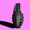 Black Metallic Grenade Isolated On Pink Background With Detailed Surface Texture
